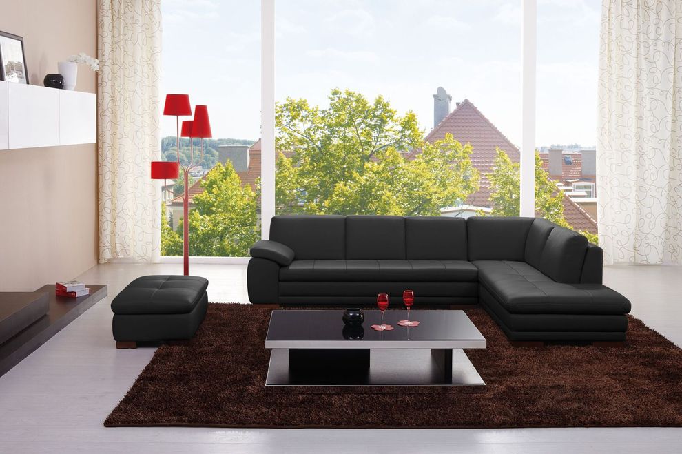 Black full Italian leather sectional sofa by J&M