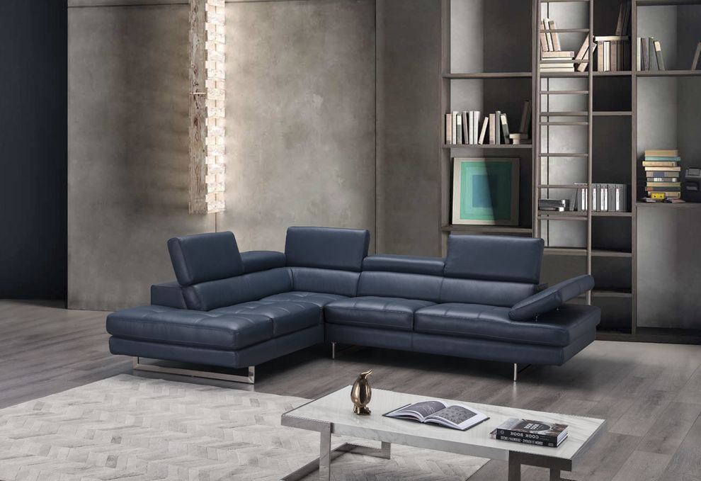 Compact blue leather sofa with adjustable armrests by J&M