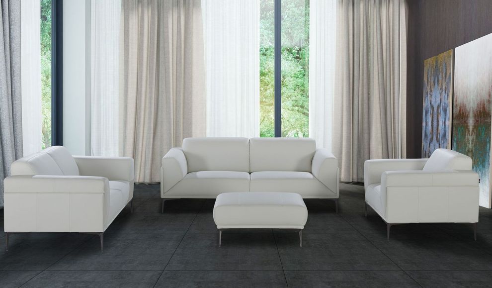 White leather ultra-modern sofa w/ chrome legs by J&M