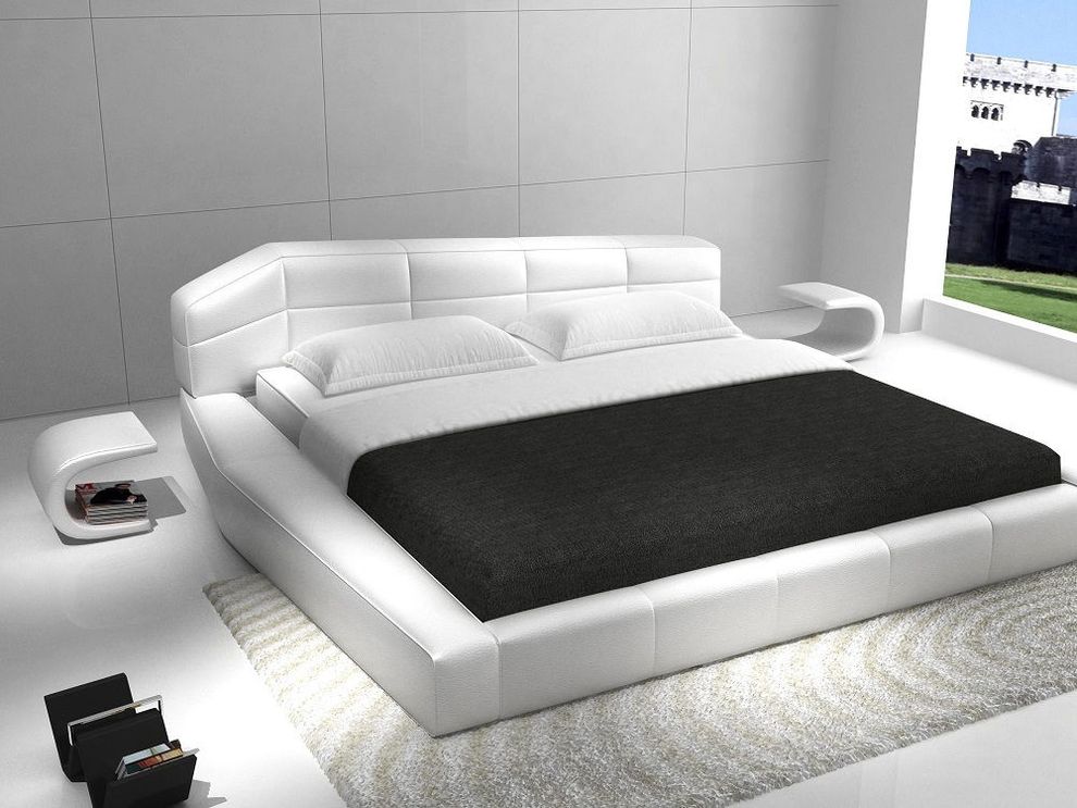 White leather low-laying contemporary king bed by J&M