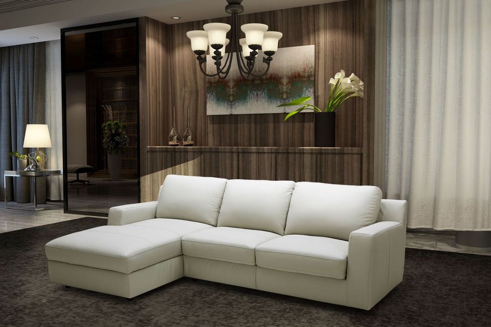 Cream leather sectional w/ sleeper and storage by J&M