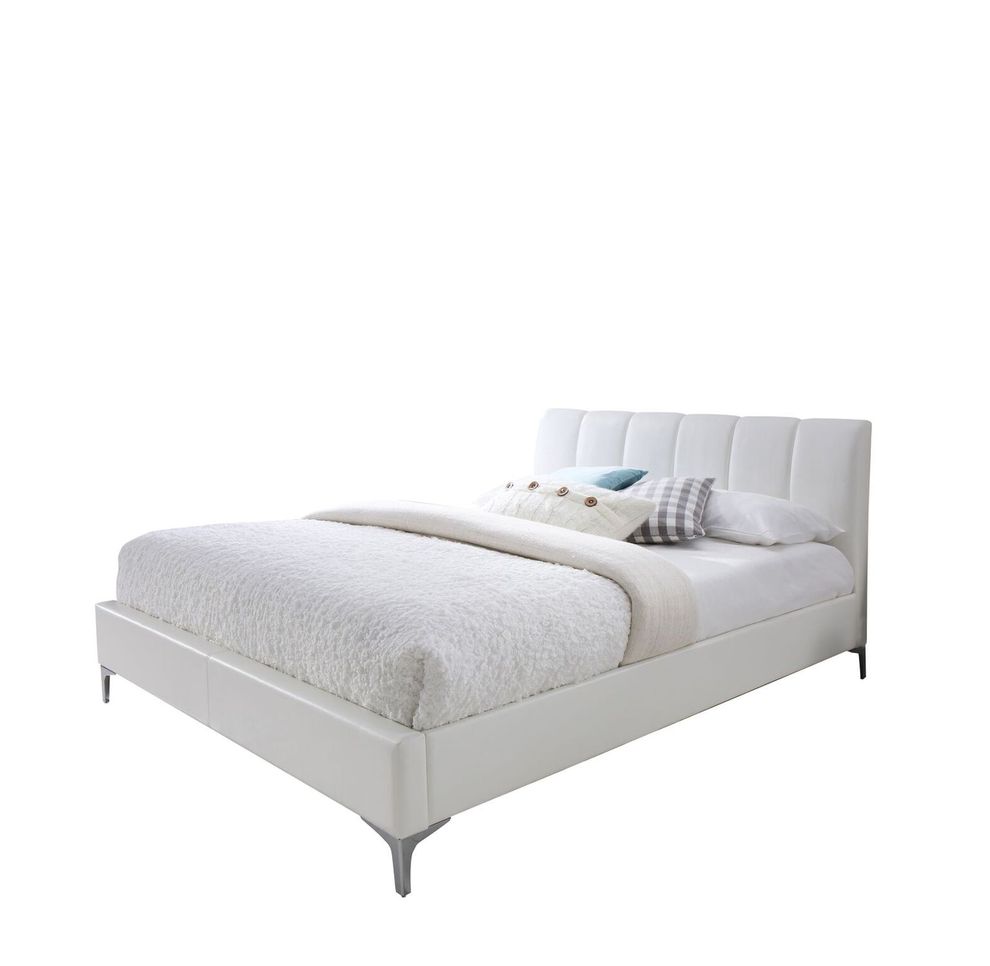 White upholstered platform king bed by J&M