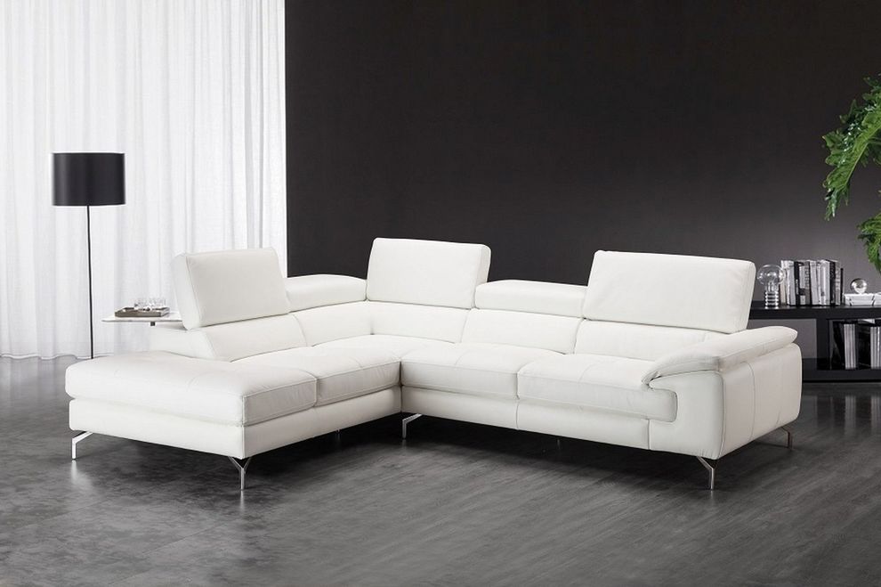 Low-profile white leather sectional sofa by J&M