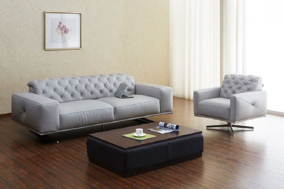 Contemporary leather sofa with dense tufted back by J&M