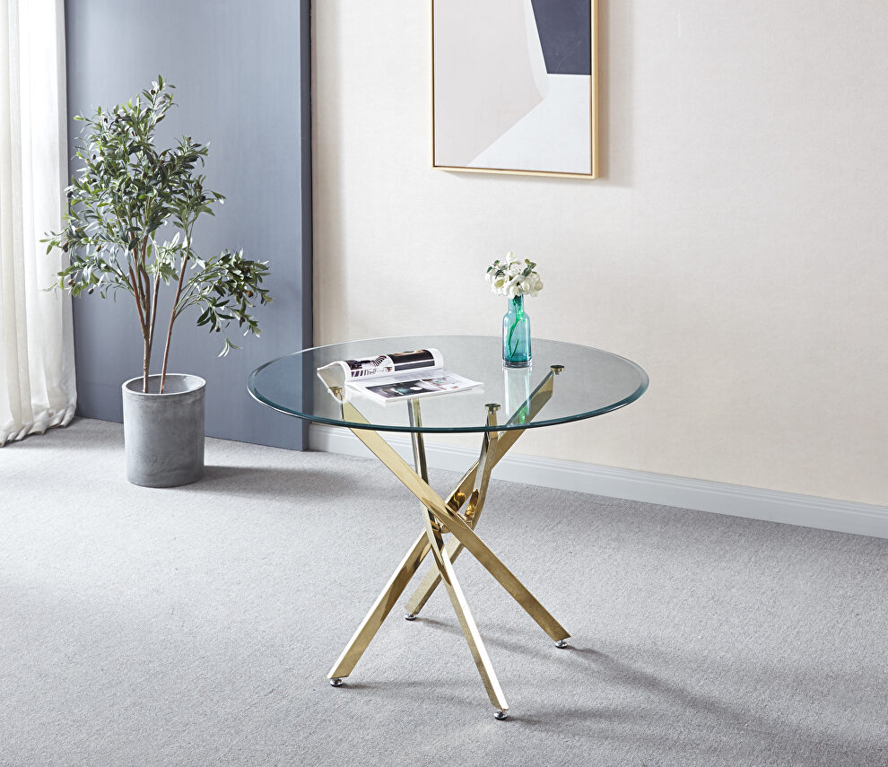 Contemporary round clear dining tempered glass table with chrome legs in gold by La Spezia