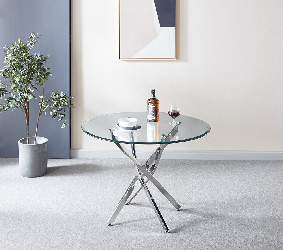 Contemporary round clear dining tempered glass table with chrome legs in silver by La Spezia