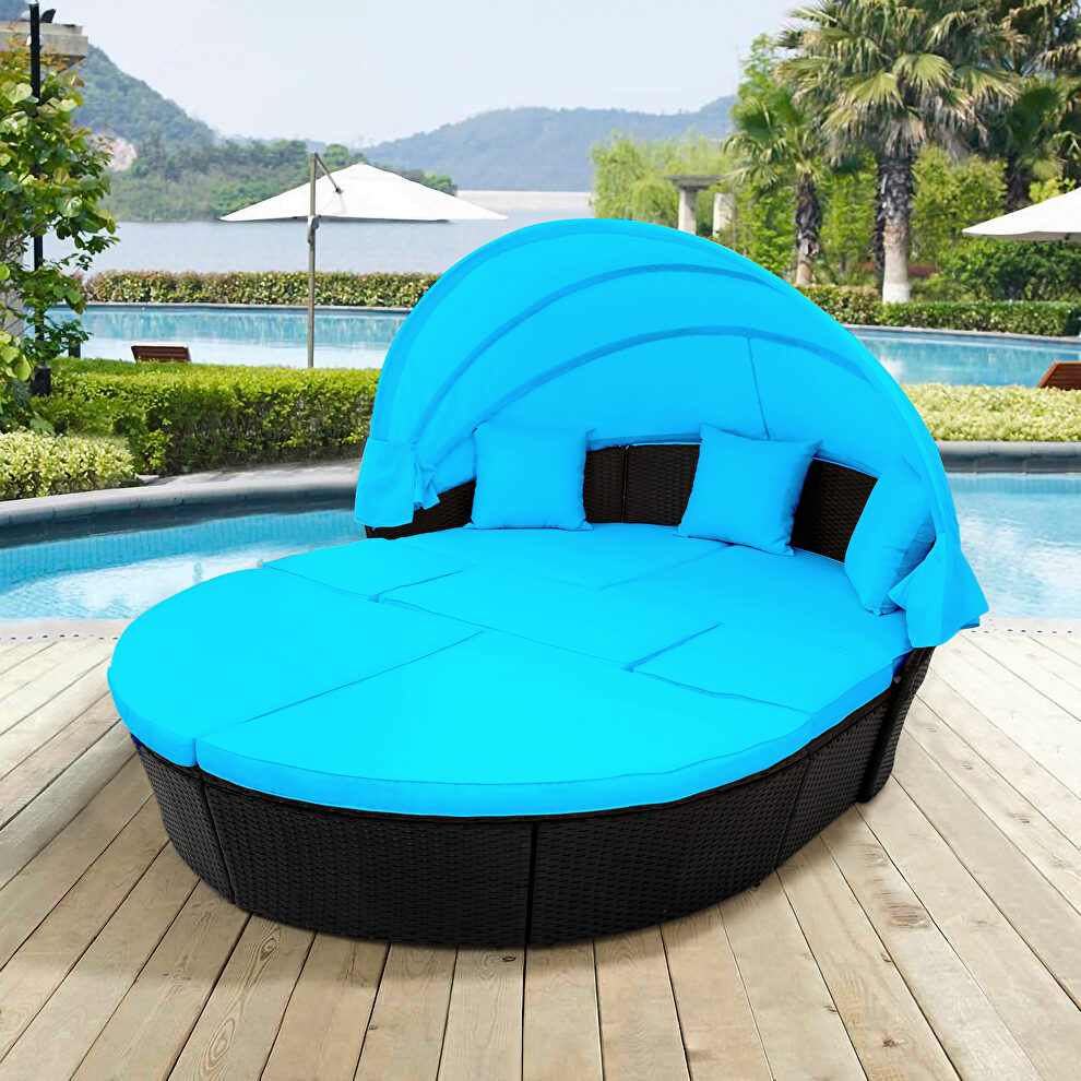 Blue outdoor rattan daybed sunbed with retractable canopy wicker furniture, round outdoor sectional sofa set by La Spezia