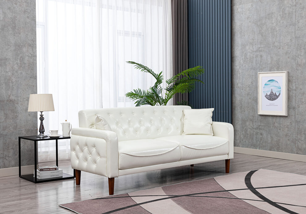 Ivory pu leather tufted buttons sofa by La Spezia