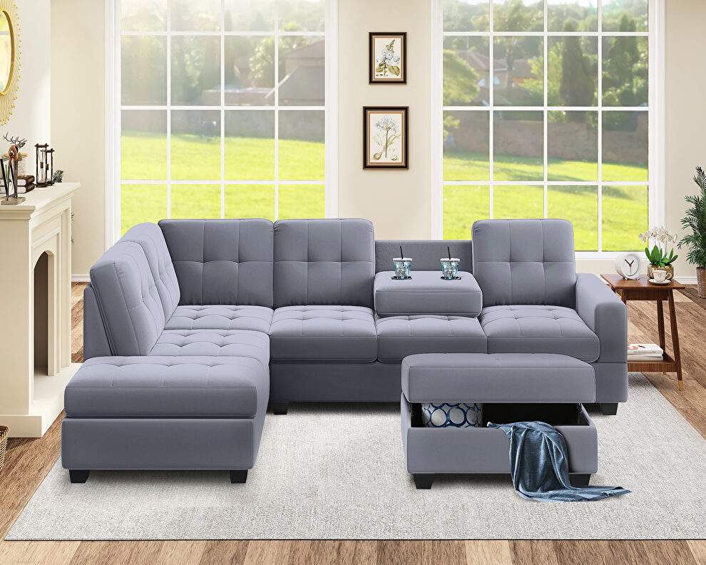 Gray velvet l-shaped sectional sofa with reversible chaise and storage ottoman by La Spezia