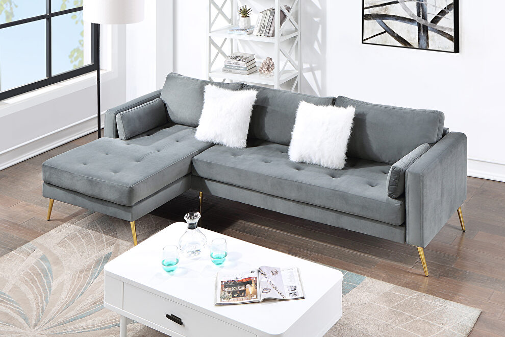 Modern elegant gray velvet sectional sofa with two pillows by La Spezia