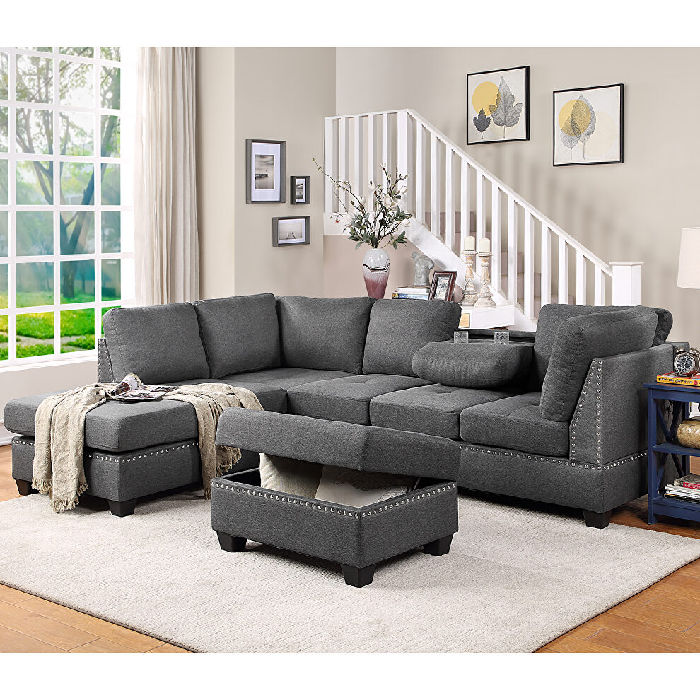 Gray linen reversible sectional sofa with storage ottoman by La Spezia