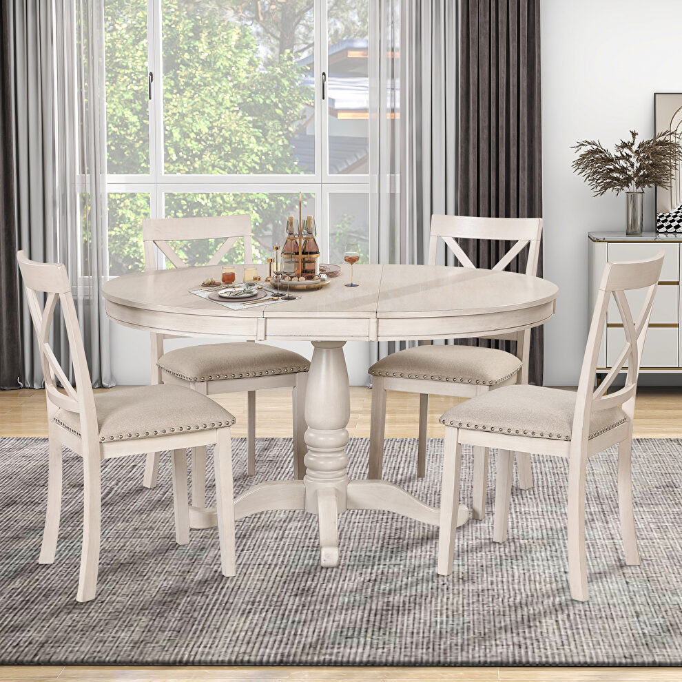 Modern dining table set: round table and 4 chairs in antique white by La Spezia