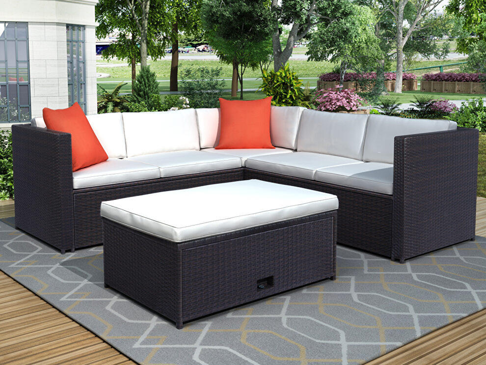 Beige cushioned outdoor patio rattan furniture sectional 4 piece set by La Spezia