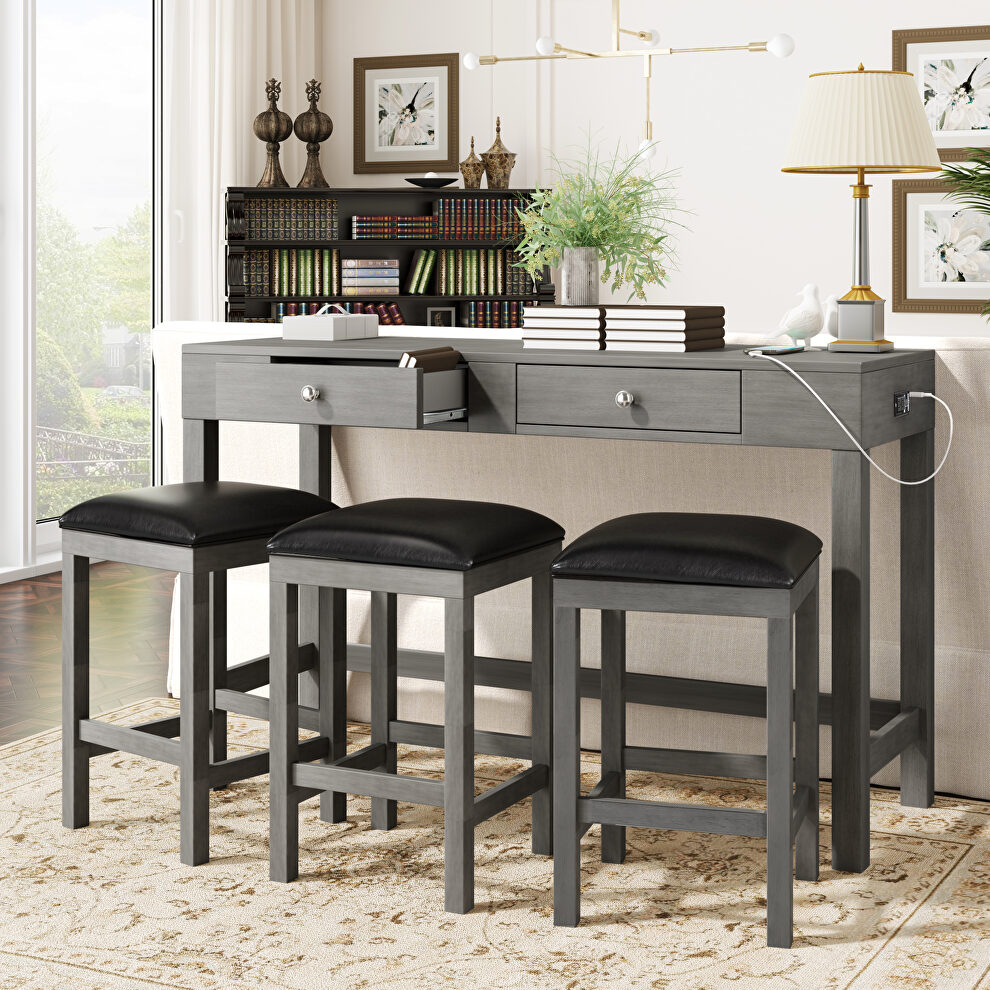 Gray 4-piece counter height table set with socket and leather padded stools by La Spezia