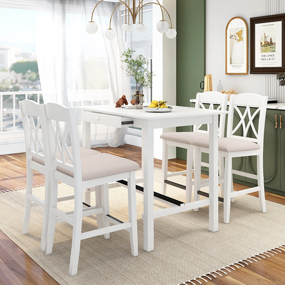 Counter height white wood 5-piece dining table set with 4 upholstered chairs and 1 storage drawer by La Spezia