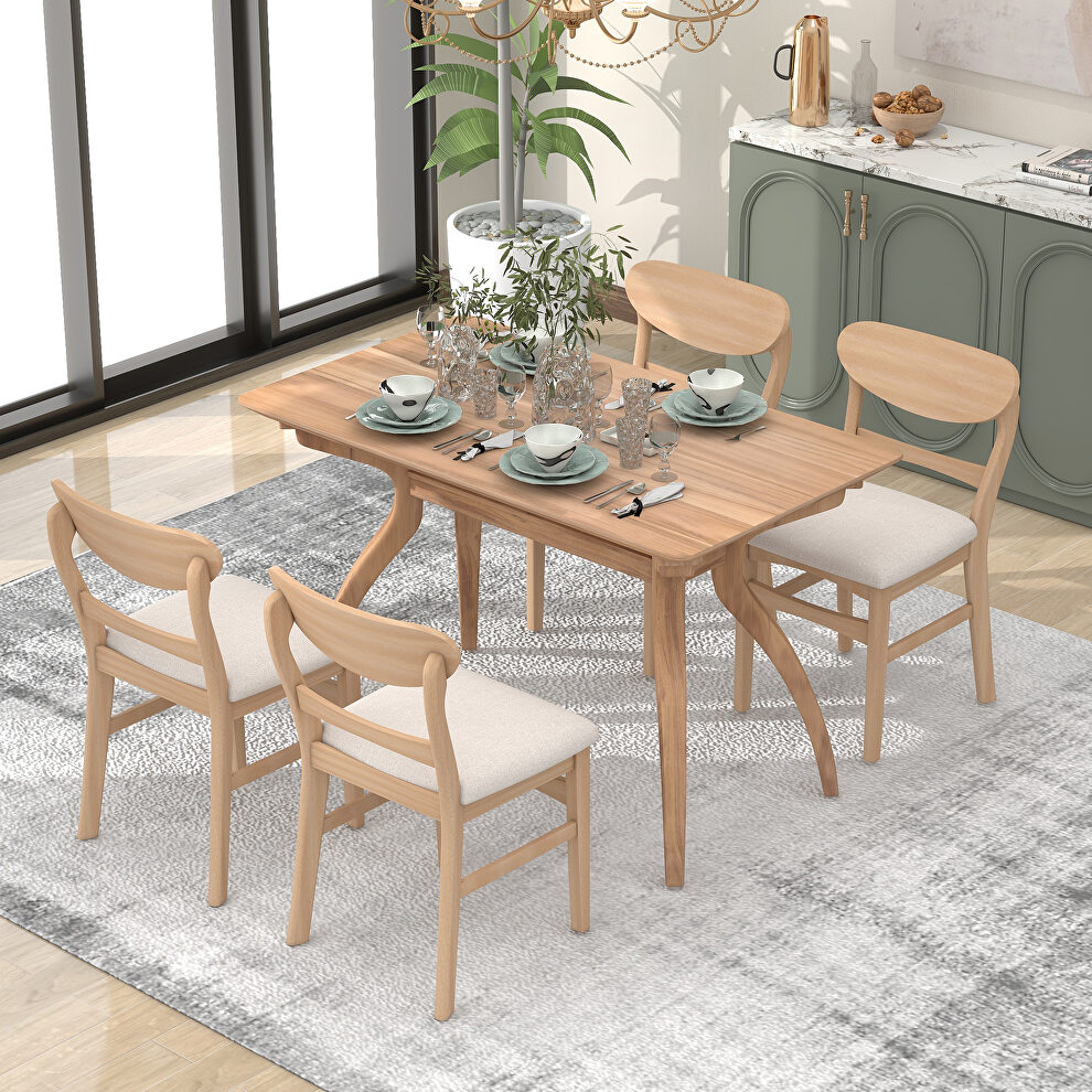 Natural wood wash rubber wood frame dining table set with special shape legs and 4 soft cushion chairs by La Spezia