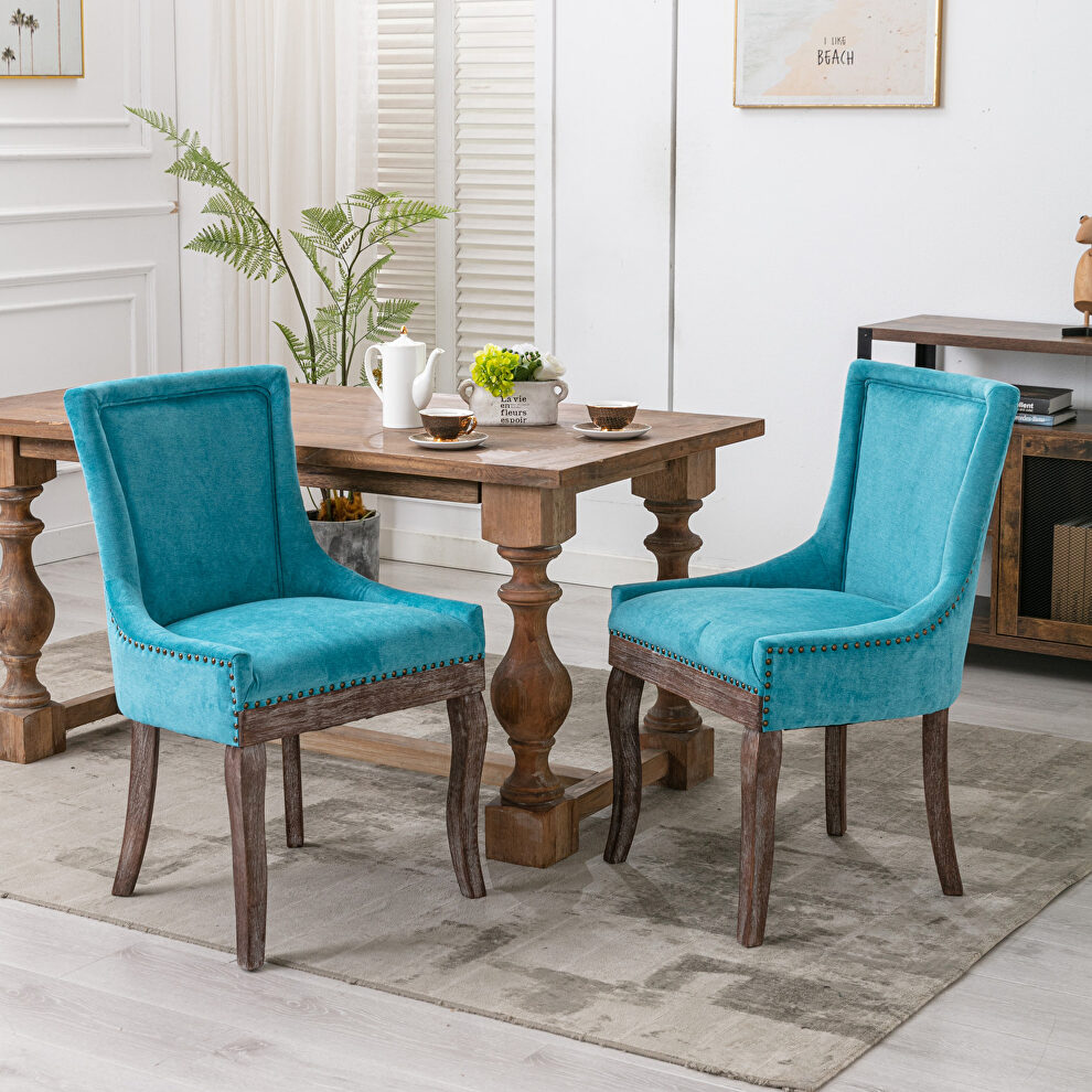 Blue fabric dining chairs with neutrally toned solid wood legs bronze nailhead, set of 2 by La Spezia