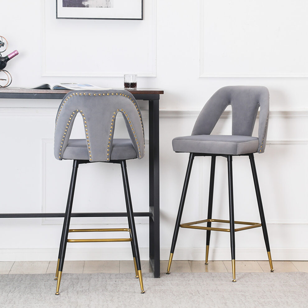 Gray velvet upholstered bar stool with nailheads and gold tipped black metal legs, set of 2 by La Spezia