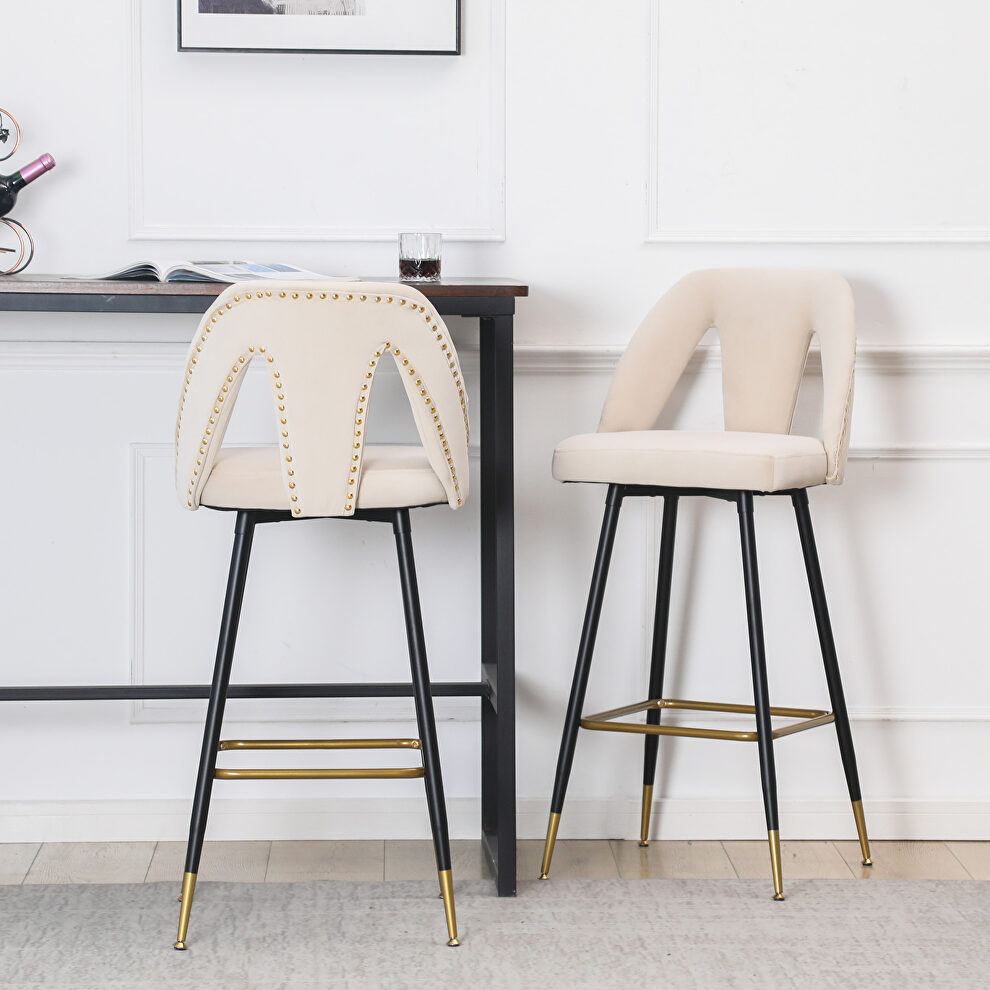 Beige velvet upholstered bar stool with nailheads and gold tipped black metal legs, set of 2 by La Spezia
