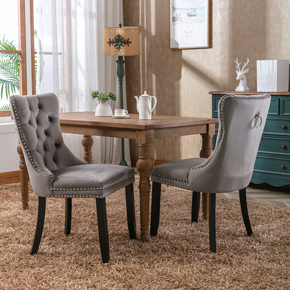Gray velvet upholstery dining chair with wood legs by La Spezia