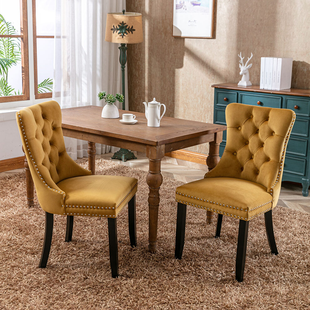 Gold velvet upholstery dining chair with wood legs by La Spezia