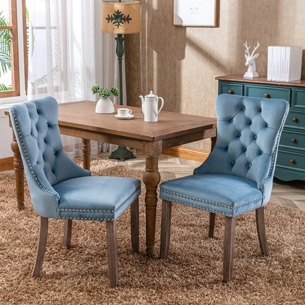 Light blue velvet upholstery dining chair with wood legs by La Spezia