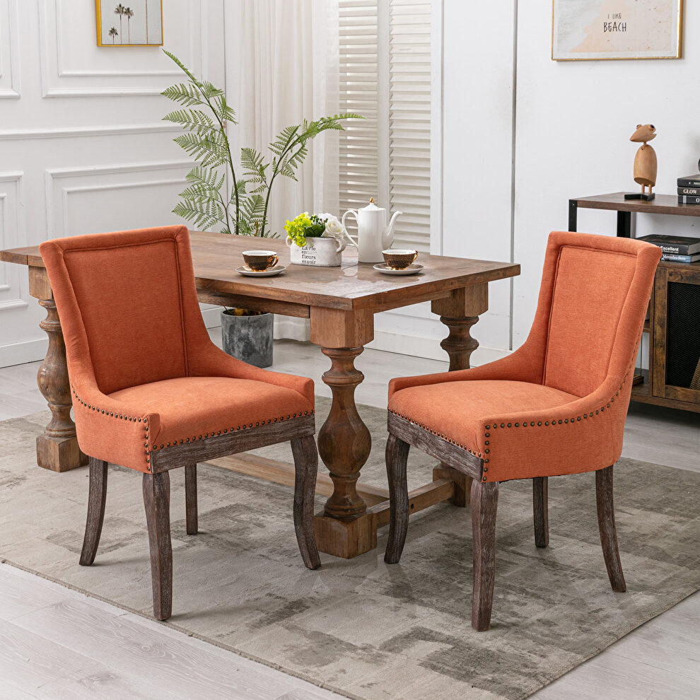 Orange fabric dining chairs with neutrally toned solid wood legs bronze nailhead, set of 2 by La Spezia