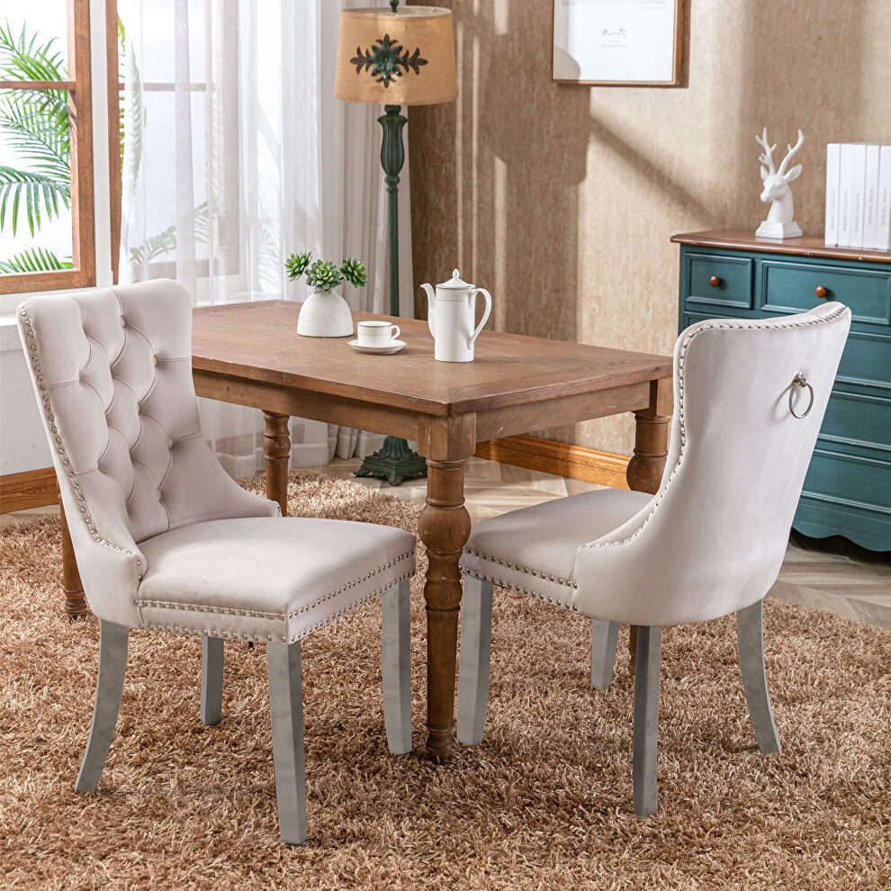 Beige velvet upholstery dining chair with wood legs by La Spezia