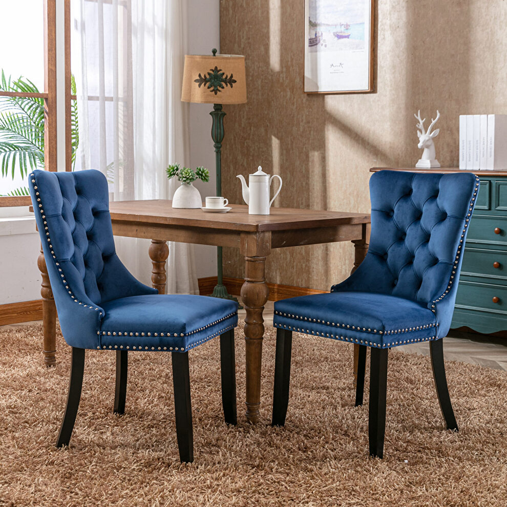 Blue velvet upholstery dining chair with wood  legs by La Spezia