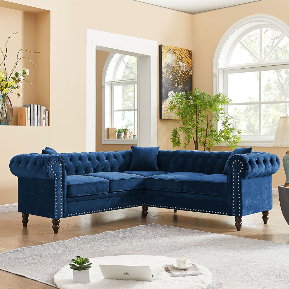 Blue velvet deep button tufted back chesterfield l-shaped sofa by La Spezia