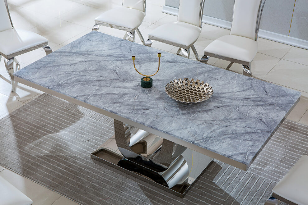 Marble top rectangular large dining table with silver mirrored finish stainless steel base by La Spezia