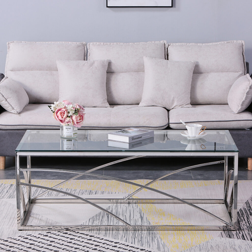 Silver stainless steel base and glass top coffee table by La Spezia