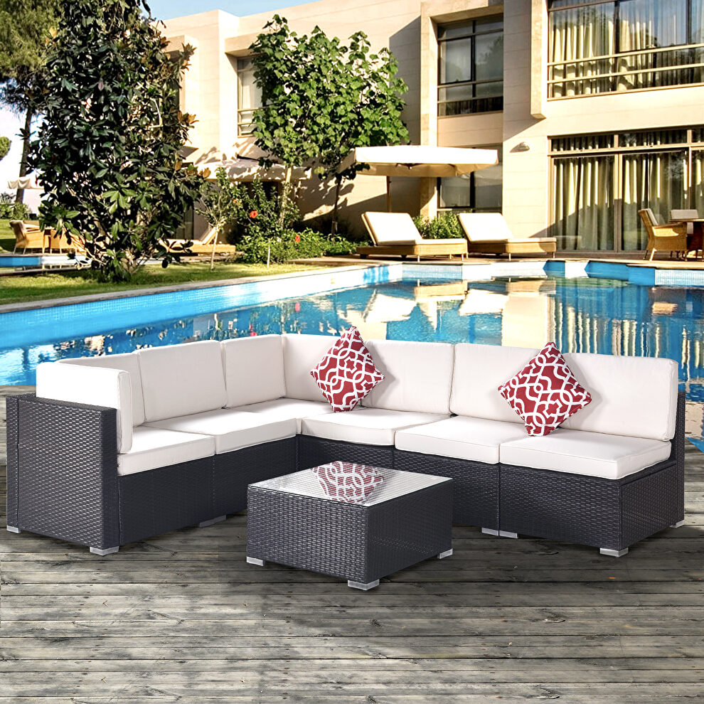 7-piece pe rattan wicker sectional cushioned sofa set and coffee table by La Spezia