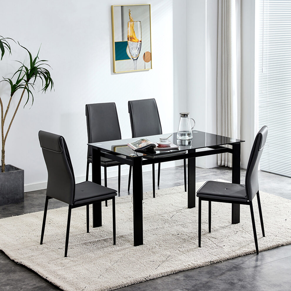 5-pieces dining table set: tempered glass dining table and 4 faux leather chairs in black by La Spezia