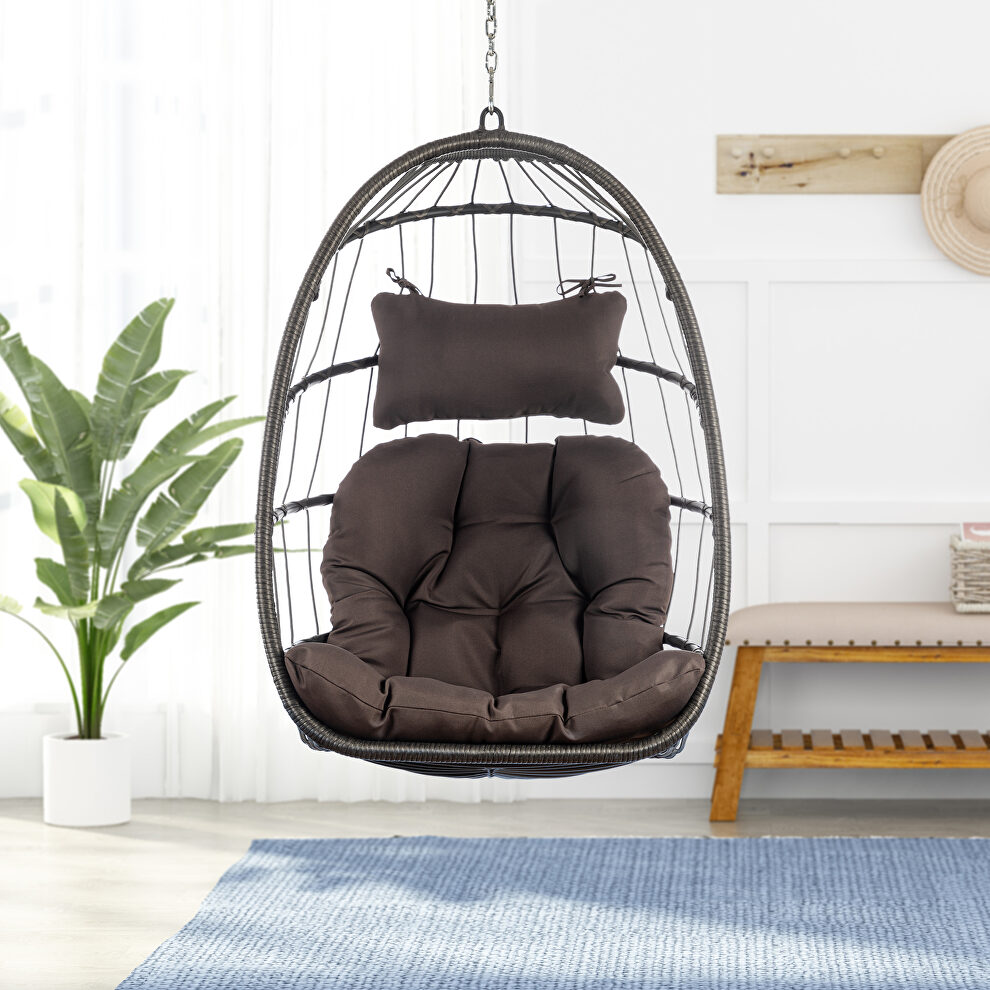 Outdoor wicker rattan swing chair with aluminum frame and dark gray cushion by La Spezia