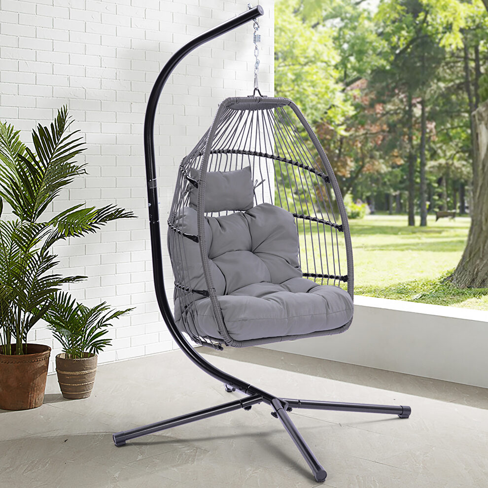 Outdoor patio wicker folding hanging chair rattan with gray cushion and pillow by La Spezia