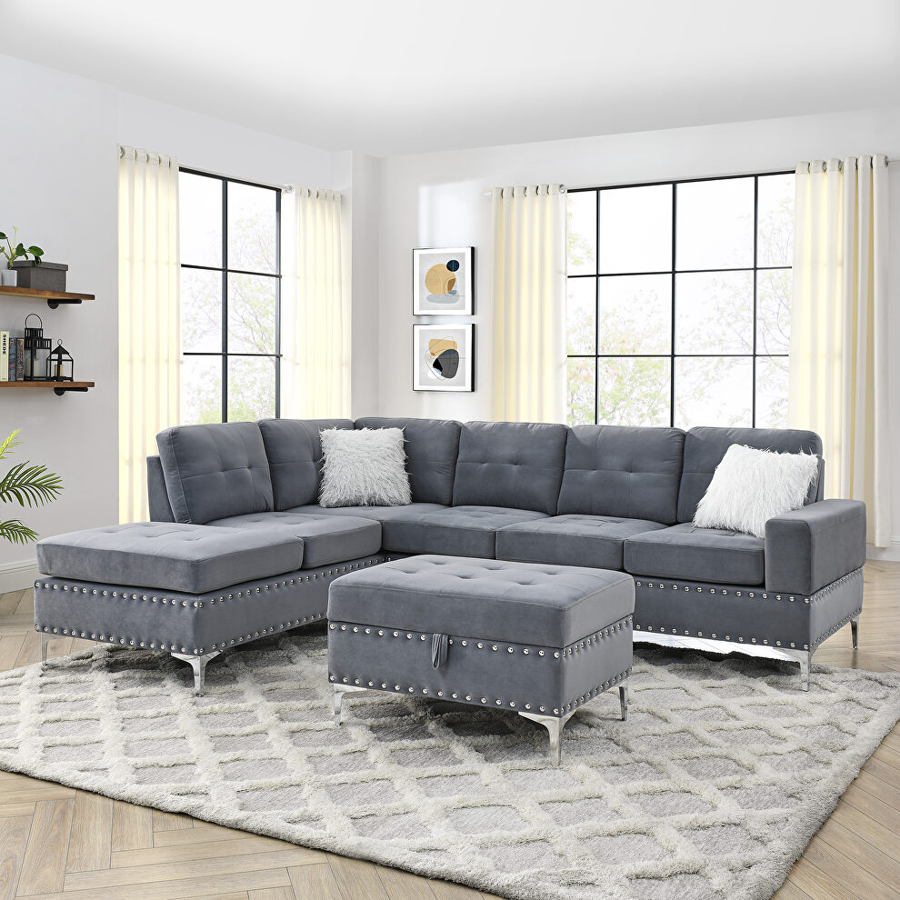 Gray velvet sectional sofa with reversible chaise storage ottoman and cup holders by La Spezia