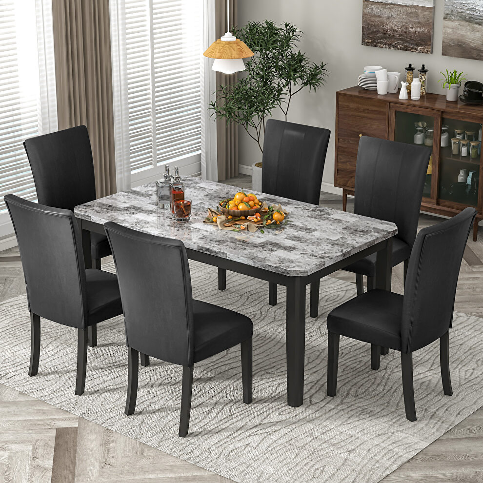 7-piece dining table set: faux marble top table and 6 upholstered seat chairs by La Spezia