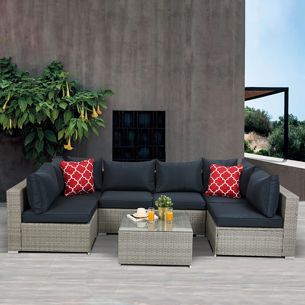 7-piece pe rattan wicker sectional cushioned sofa sets with 2 pillows and coffee table by La Spezia