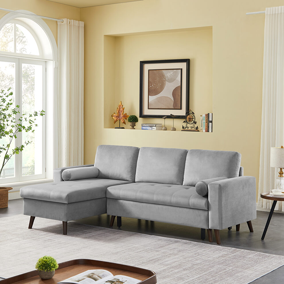Gray velvet reversible sleeper sectional sofa with storage chaise by La Spezia
