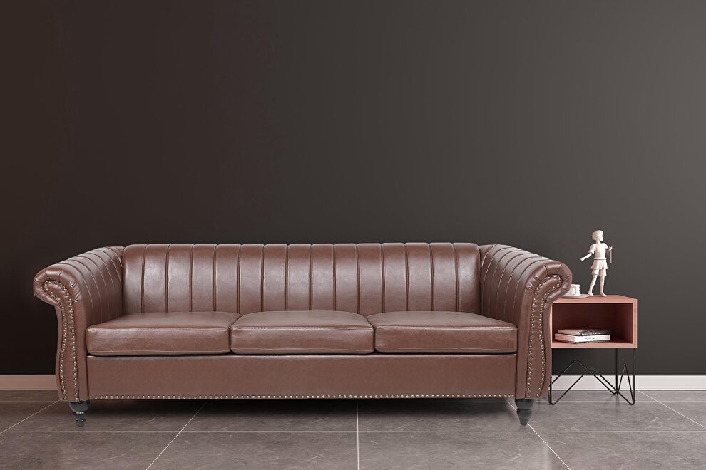 Brown pu rolled arm chesterfield three seater sofa by La Spezia