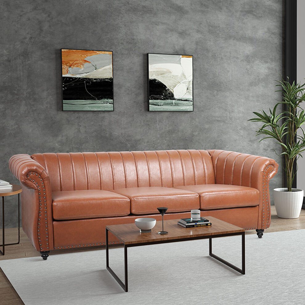 Brown pu rolled arm chesterfield three seater sofa by La Spezia