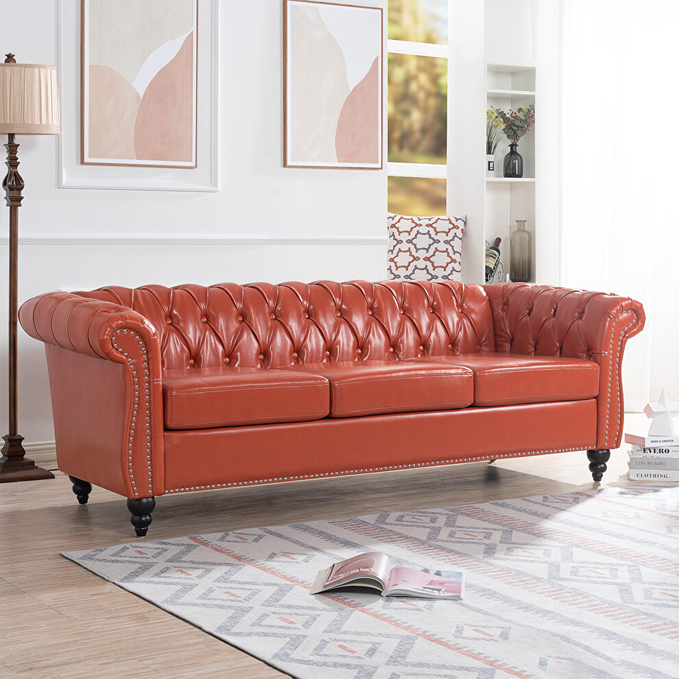 Orange pu uphostery rolled arm chesterfield three seater sofa by La Spezia