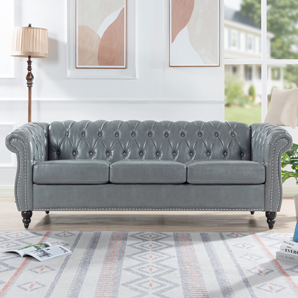 Gray pu uphostery rolled arm chesterfield three seater sofa by La Spezia