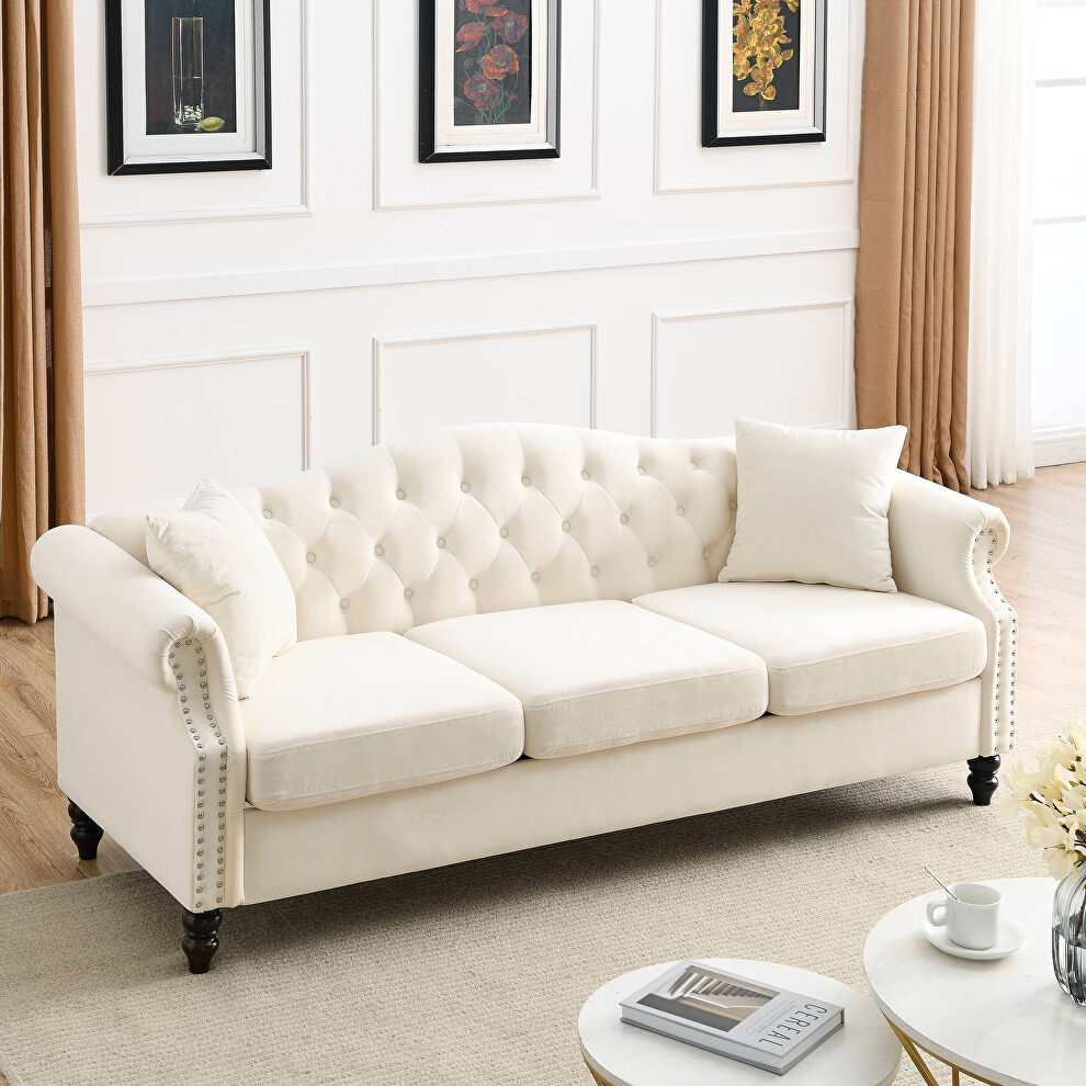 Beige velvet tufted chesterfield sofa with rolled arms and nailhead by La Spezia