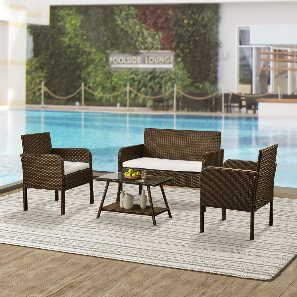 U-style 4 piece rattan sofa seating group with cushions by La Spezia