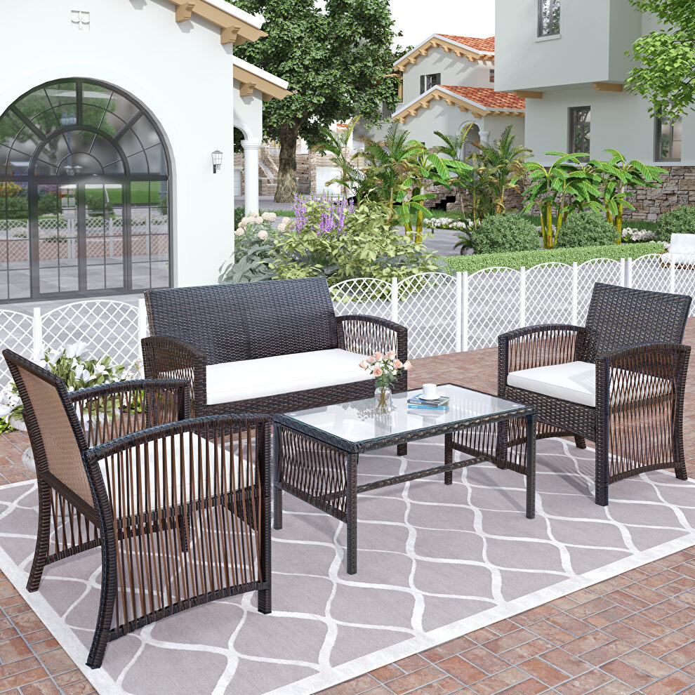 Brown rattan chair, sofa and table patio 4 piece set by La Spezia