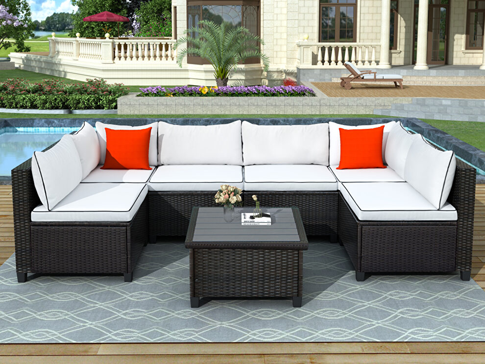 U-shape sectional outdoor furniture set w/ beige cushions by La Spezia