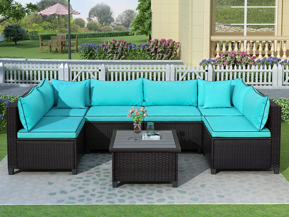 U-shape sectional outdoor furniture set w/ blue cushions by La Spezia