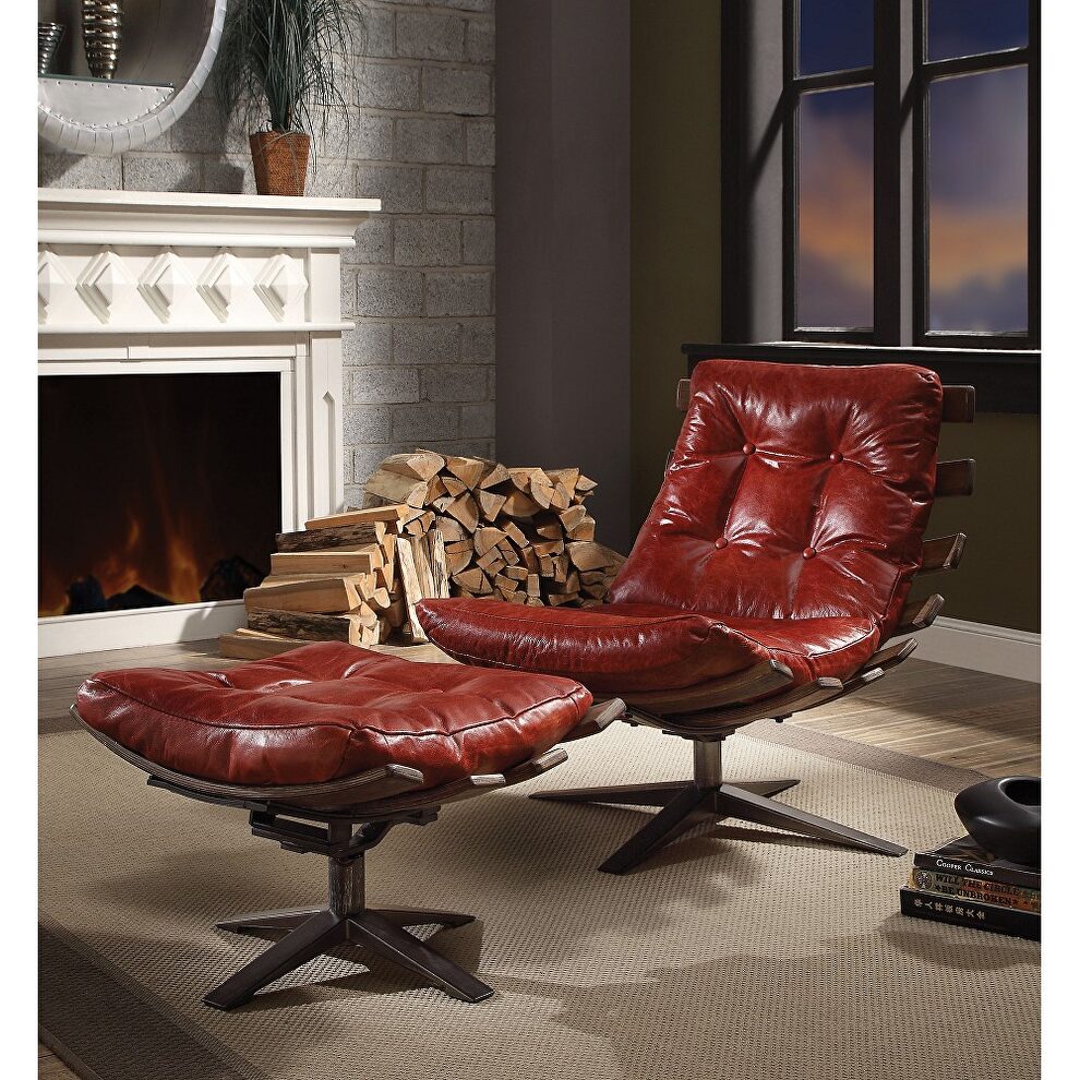 Antique red top grain leather chair and ottoman by La Spezia